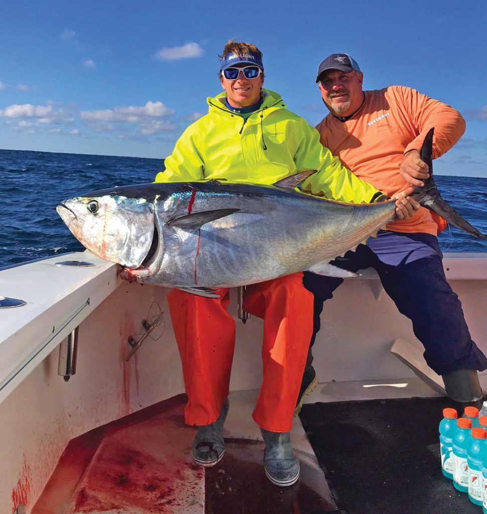 Ted Prager and his son Teddy with a late season 60-inch bluefin