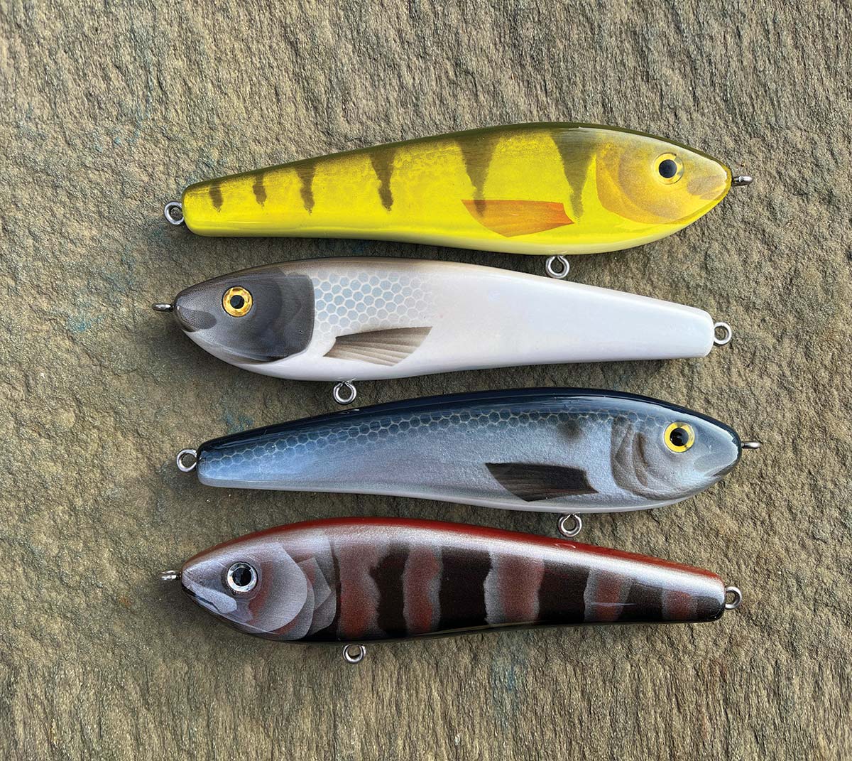 Here's some wood fishing lures I made. Carved from Western Red