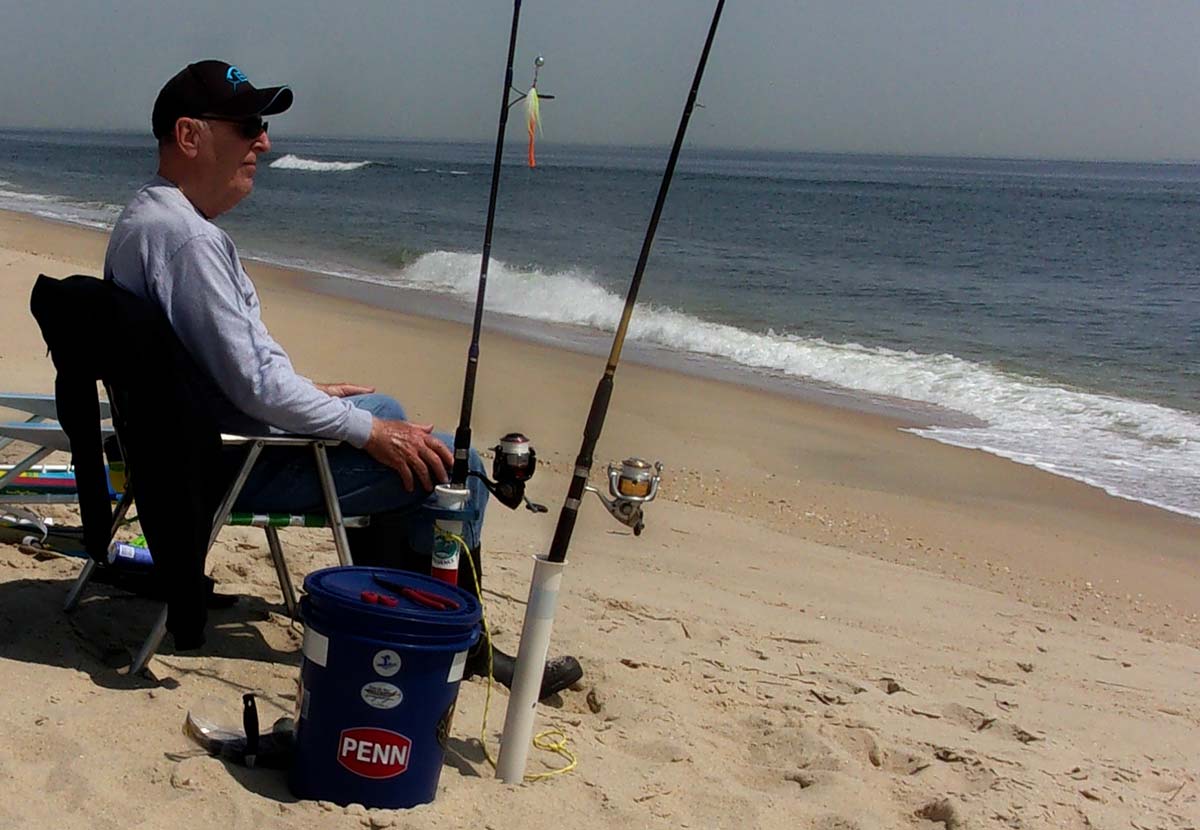 Fishing a Dark Matter OB Surf Spinning Rod in the open beach is an